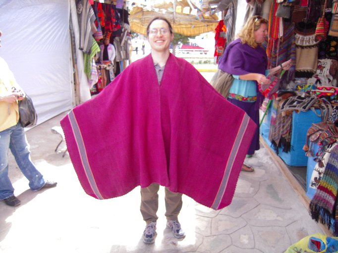 Magenta poncho in Puno market
